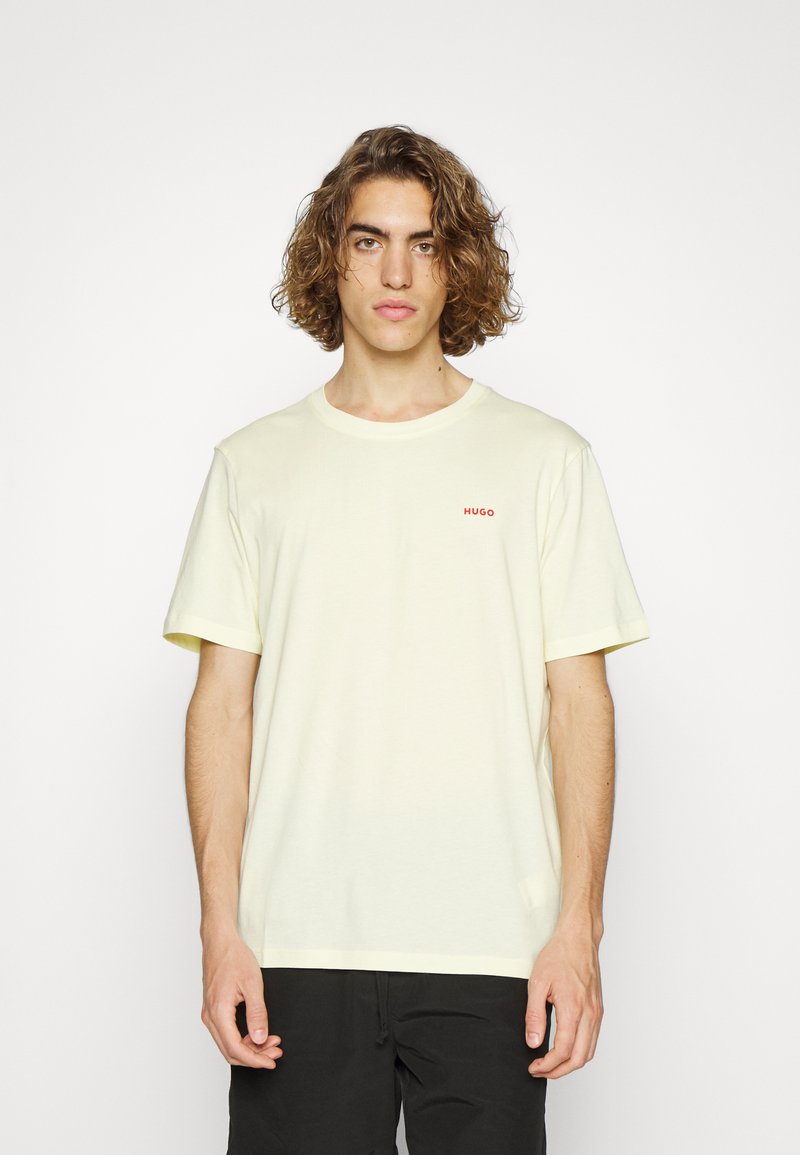HUGO DERO - T-shirt básica - light/pastel yellow