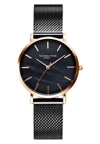 Reloj redondo negro con caja de oro rosa, esfera negra y pulsera de malla metálica. Cuenta con marcadores de hora minimalistas y el logo en el centro.
