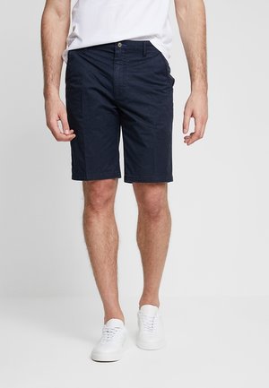 Granatowe szorty wykonane z bawełnianej mieszanki tkanin, o prostym kroju, wyposażone w boczne kieszenie i pojedyncze zapięcie na guzik w talii.