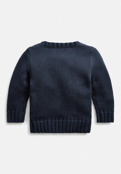 Navy knitted sweater with a ribbed crew neckline and hem. Features long sleeves and textured fabric, showcasing a thick stitch pattern.