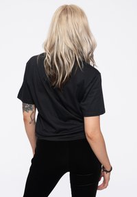 Paradiso Clothing THE ROLLING STONES TATTOO YOU  FLAMES - Print T-shirt - black