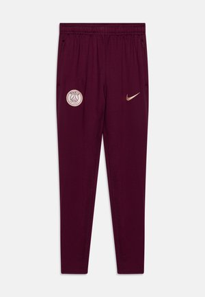 Bordeaux sportbroek met een elastische tailleband, zijzakken, gouden accenten, met een Parijs-logo en een Nike swoosh-logo op de voorkant.