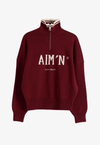 Suéter pulóver marrón con cremallera hasta la mitad, cuello alto con una franja blanca, puños y dobladillo acanalados, y logo blanco "AIM'N SPORTSWEAR" en el frente.