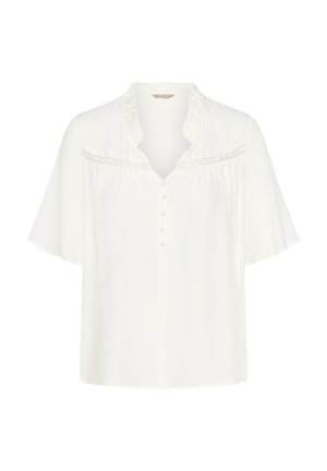 Balta trumpa rankovėmis palaidinė su raukšlėtu V formos dekolte, audiniu dangstytais sagutėmis ir nėriniu per krūtinę.