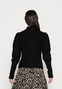 Gestuz Strickjacke - black
