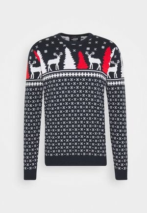 Maglione lavorato a maglia blu navy con motivi di fiocchi di neve bianchi, alberi rossi e renne. Collo rotondo e maniche lunghe con polsini e orlo a costine.