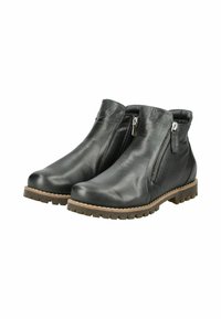 Bottines en cuir noir à fermeture éclair sur le côté, semelles en caoutchouc et détails texturés. Bout arrondi avec semelle robuste.