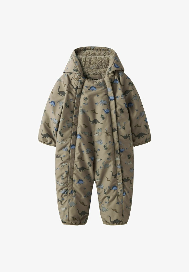 Un combinaisons beige avec des motifs de dinosaure et de palmier. Doublure douce et texturée, capuche, poignets élastiques et fermeture éclair. Convient pour un usage extérieur.