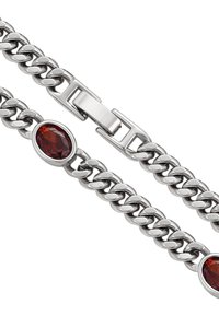 Bracciale in argento con gemme ovali rosse, una chiusura a toggle elegante e maglie arrotondate lisce con una finitura lucida.