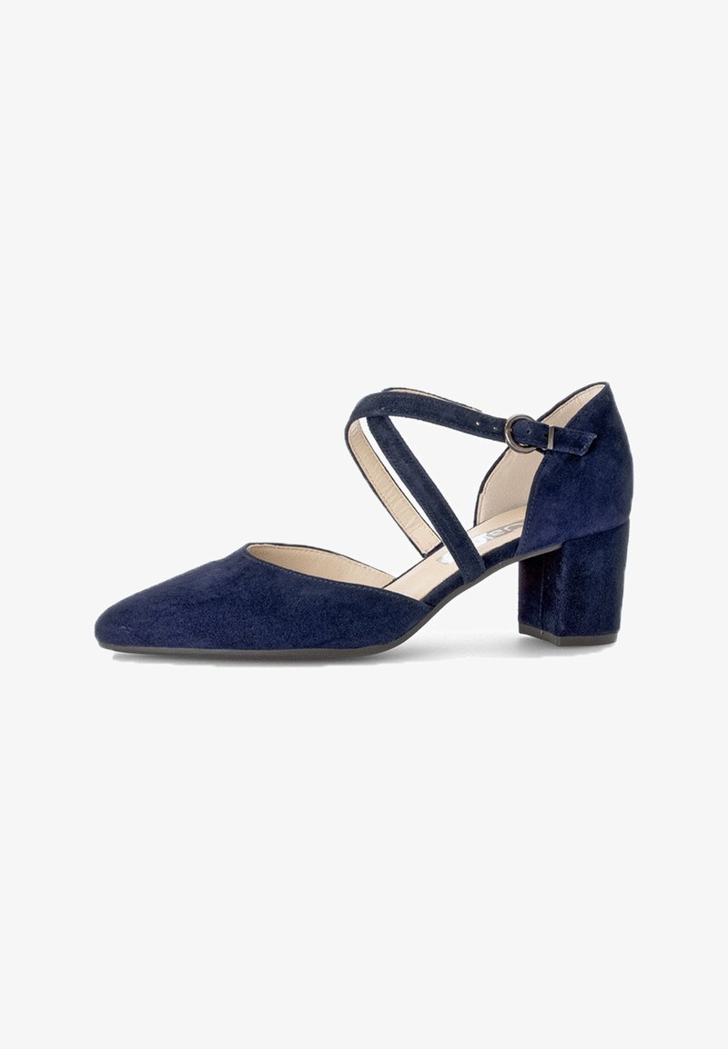 Navy blue suede high heel shoe with a pointed toe, cross-strap design, adjustable buckle, and a chunky block heel.