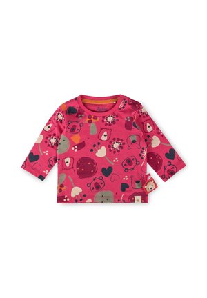 Langarmshirt aus leuchtend pinkem Baumwollstoff mit Bären-, Blumen- und Herzmustern. Verfügt über einen runden Ausschnitt und ein seitliches Etikett.