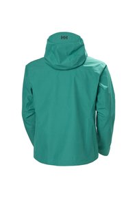 Petrolkleurige waterdichte jas met capuchon, lange mouwen en het "HH"-logo op de achterkant van de capuchon, gezien vanaf de achterkant.