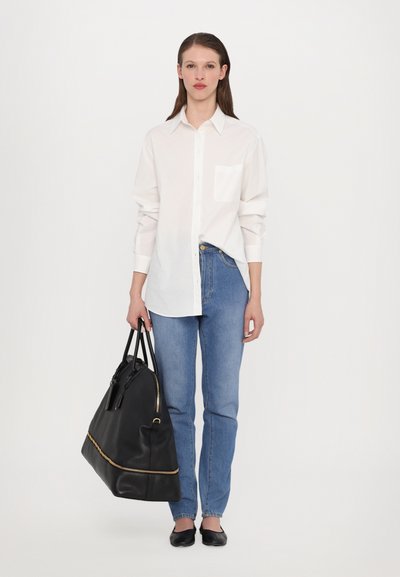 MOSCHINO FOLDING BAG - Sac week-end - nero
