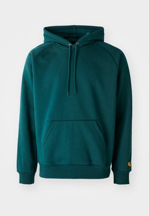 Hoodie en teal avec une poche kangourou, des cordons de serrage et des poignets côtelés. Tissu doux avec une texture lisse, mettant en avant un accent de logo sur la manche.