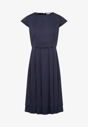 Donkerblauwe jurk tot op de knie met korte mouwen, getailleerde taille, geplooide rok en een ritssluiting aan de achterkant.