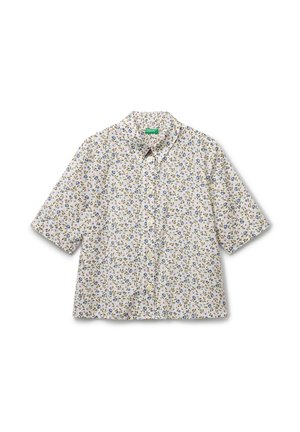 Chemise boutonnée à manches courtes, ornée d'un petit motif floral bleu et violet sur fond blanc.