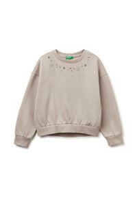 Felpa corta beige chiaro con orlo e polsini a coste, caratterizzata da motivi di stelle sparse e piccoli dettagli decorativi sul davanti.