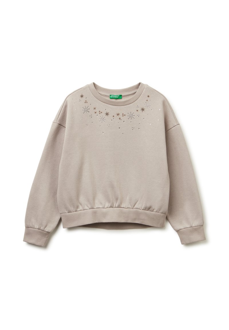Felpa corta beige chiaro con orlo e polsini a coste, caratterizzata da motivi di stelle sparse e piccoli dettagli decorativi sul davanti.