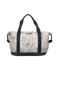 Cremfarbener Duffle Bag mit marineblauen Trägern, versehen mit einer verspielten Illustration und grafischen Details. Mit Reißverschluss am Boden.