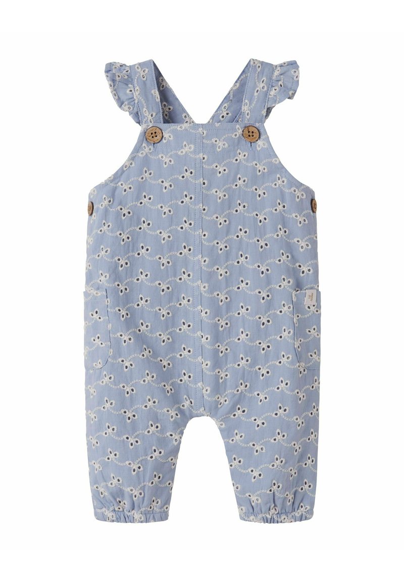 Mėlyni medvilniniai kombinezonai su akių siuvinėjimu gėlių raštu, raukšlėtomis petnešėlėmis, mediniais mygtukais ir šonine kišene.