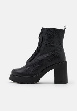 Bottines à talons hauts - black