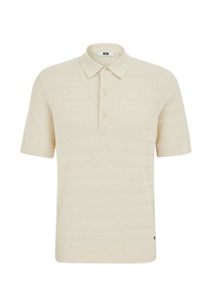 Kremowa, krótka koszulka typu polo z dzianiny, z teksturowanym wzorem w zygzak, zapinana na trzy guziki, z prążkowanym kołnierzem i mankietami.
