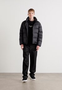 Calvin Klein PUFFER - Dunjakker - black