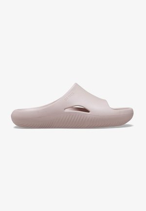 Zoccolo rosa chiaro slip-on con suola spessa, apertura laterale per la ventilazione e superficie superiore liscia, progettato per un uso casual e comfort.