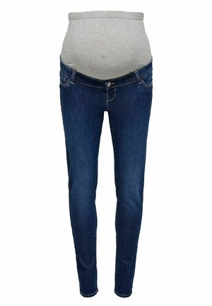 Jean de grossesse bleu avec un panneau en tissu gris extensible sur le ventre et une taille défait pour le confort.