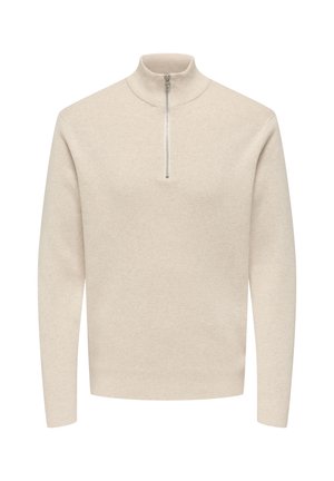 Helebeežikas pulloverite-särgi pikkade varrukatega, kõrge kraega ja lühikese tõmblukuga. Omaduseks on tekstuuriga kootud kangas.