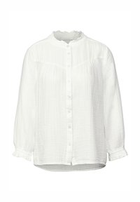 Blusa bianca a maniche lunghe realizzata in tessuto testurizzato, con scollatura sbruffosa, chiusura frontale con bottoni e polsi elasticizzati.
