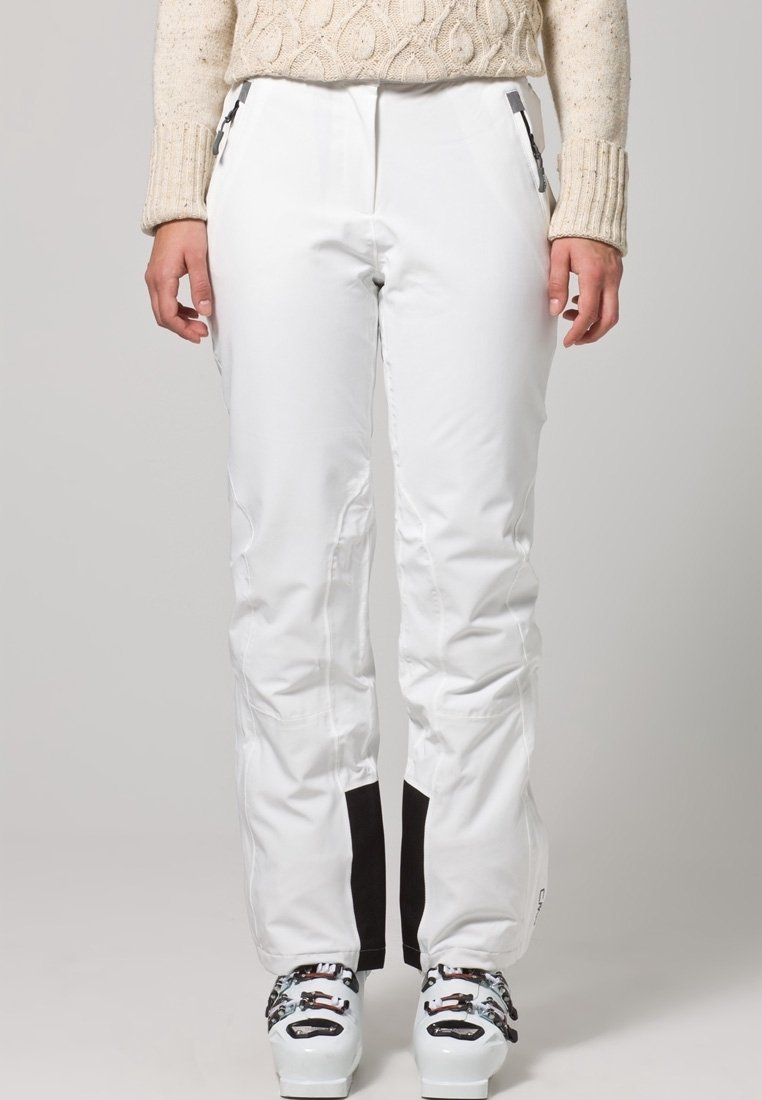 Witte skibroek met zwarte accenten, voorzien van ritsen bij de zakken en een rechte pasvorm. Gemaakt van een glad, waterdicht materiaal.