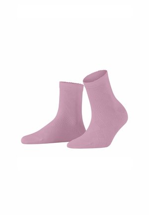 Light pink ankle socks with a textured pattern, scalloped top edge, and a snug fit. Made from soft, stretchy material for comfort.