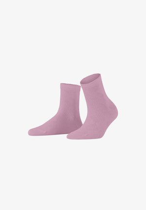 Helle rosa Knöchelsocken mit einem strukturierten Muster, gewelltem oberen Rand und einer enganliegenden Passform. Hergestellt aus weichem, dehnbarem Material für zusätzlichen Komfort.