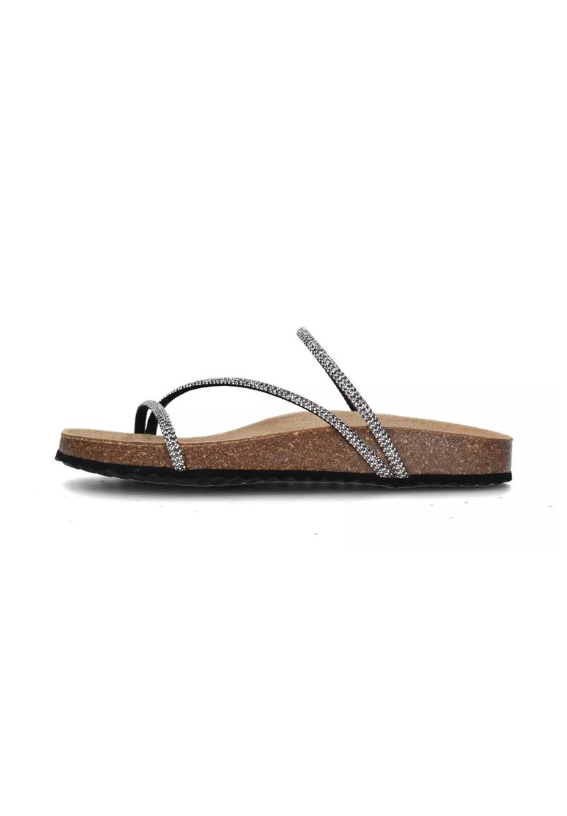 Chanclas de espuma de color negro y plateado con brillo, con una media suela de corcho y suela exterior de goma texturizada. Presentan tiras finas entrecruzadas para mayor soporte.