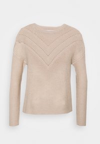 Beżowy sweter dziany z długimi rękawami, z dekoltem w kształcie litery V na korpusie oraz prążkowanym kołnierzem. Teksturowany, casualowy design.