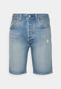 Ljusblå denimshorts med hög midja, slitna kanter och lätt slitage på framsidan. Har en klassisk femficksdesign och metallknapp.