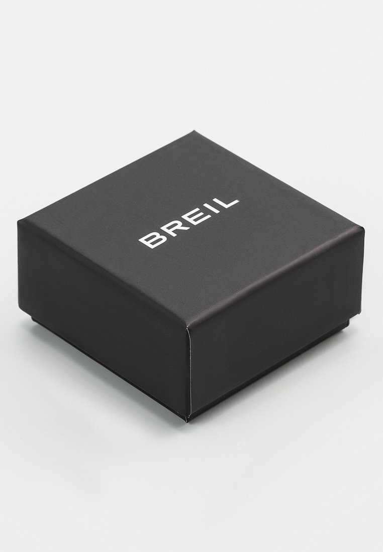 Schwarze Geschenkbox mit glatter Oberfläche, die den weißen Text "BREIL" auf der Oberseite trägt. Quadratische Form, klare Kanten und ohne Verzierungen.