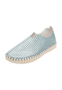 Light blue woven slip-on shoe with a textured surface and a flexible rubber sole featuring a ridged edge. Soft interior lining.