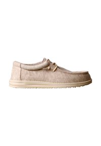 Chaussure décontractée à enfiler en tissu beige avec une semelle souple et un détail de lacet, vue de côté sur fond blanc.