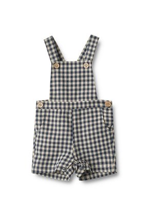 Monospace bleu marine et beige à carreaux pour bébé, avec bretelles réglables, boutons en bois, poches frontales et fermetures à pression à l'entrejambe.