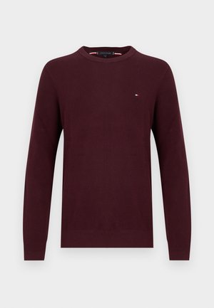 Maglione bordeaux con collo tondo, maniche lunghe, motivo a maglia strutturato e piccolo logo sul petto.