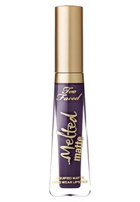 Purple Too Faced Melted Matte liquid lipstick with gold cap and gold lettering on the front highlighting matte, long-wear formula.