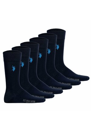 Set van zes marineblauwe sokken van zacht stof. Heeft ribgebreide boorden en een lichtblauw logo. De tekst op de tenen luidt "U.S. Polo Assn."