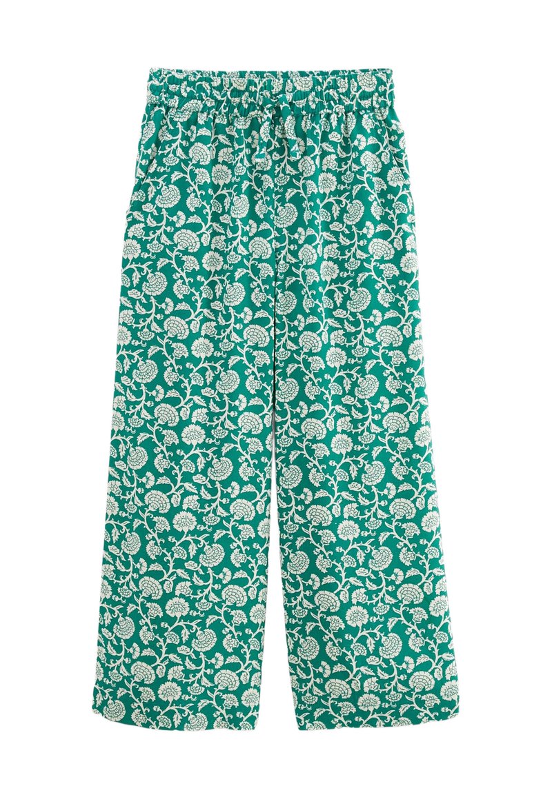 Pantalons larges imprimés floraux en tissu teal avec un motif blanc. Dotés d'une taille élastique et d'une coupe ample. Texture douce.