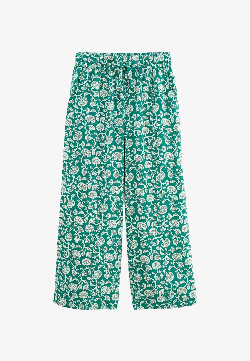 Pantalons larges imprimés floraux en tissu teal avec un motif blanc. Dotés d'une taille élastique et d'une coupe ample. Texture douce.
