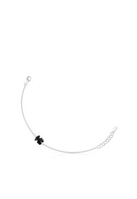 Pulsera de plata con una cadena delicada, que presenta un acento en forma de trébol negro. Incluye un cierre de langosta y longitud ajustable.