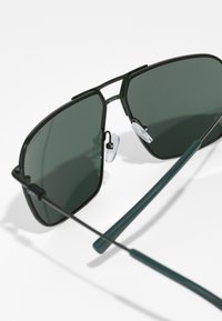 Armani Exchange Aurinkolasit - matte green