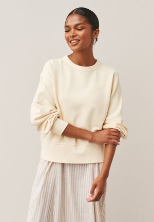 Next Sportska majica - butter yellow