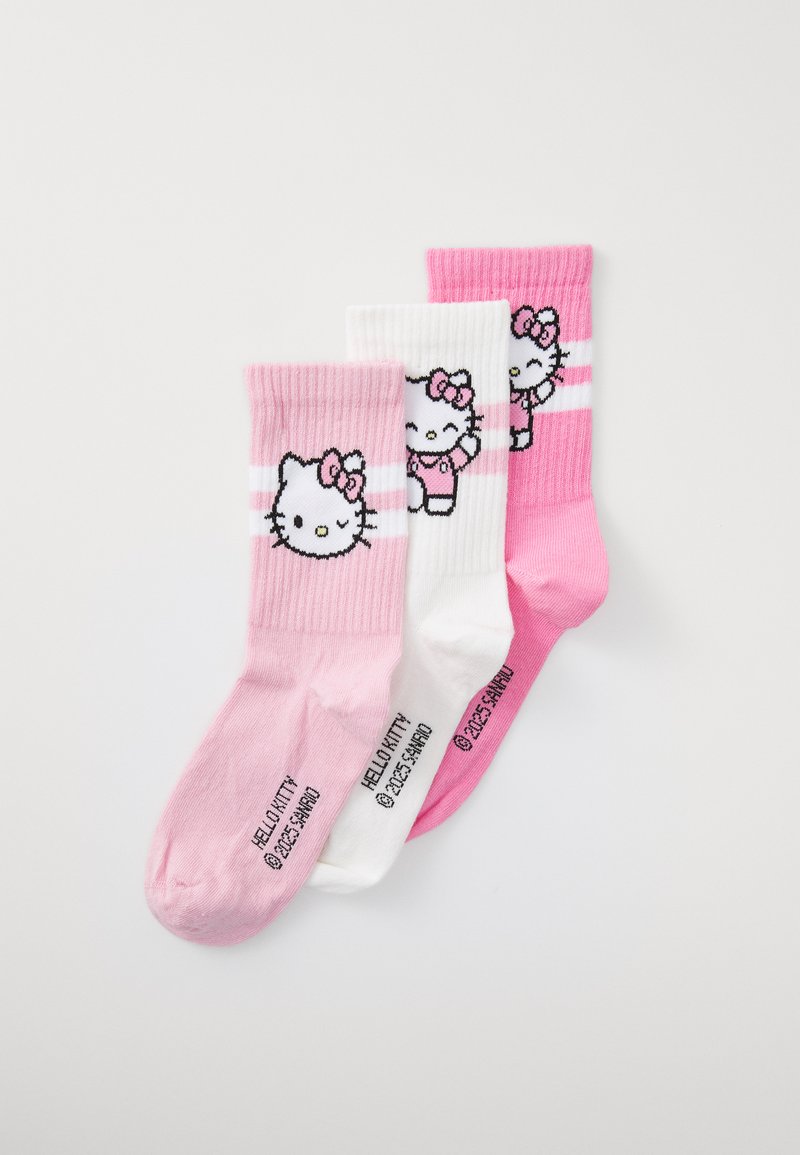 Tre par bomullssockor i rosa och vitt. Har en Hello Kitty-design på varje strumpa, med ribbad textur och kontrasterande ränder.